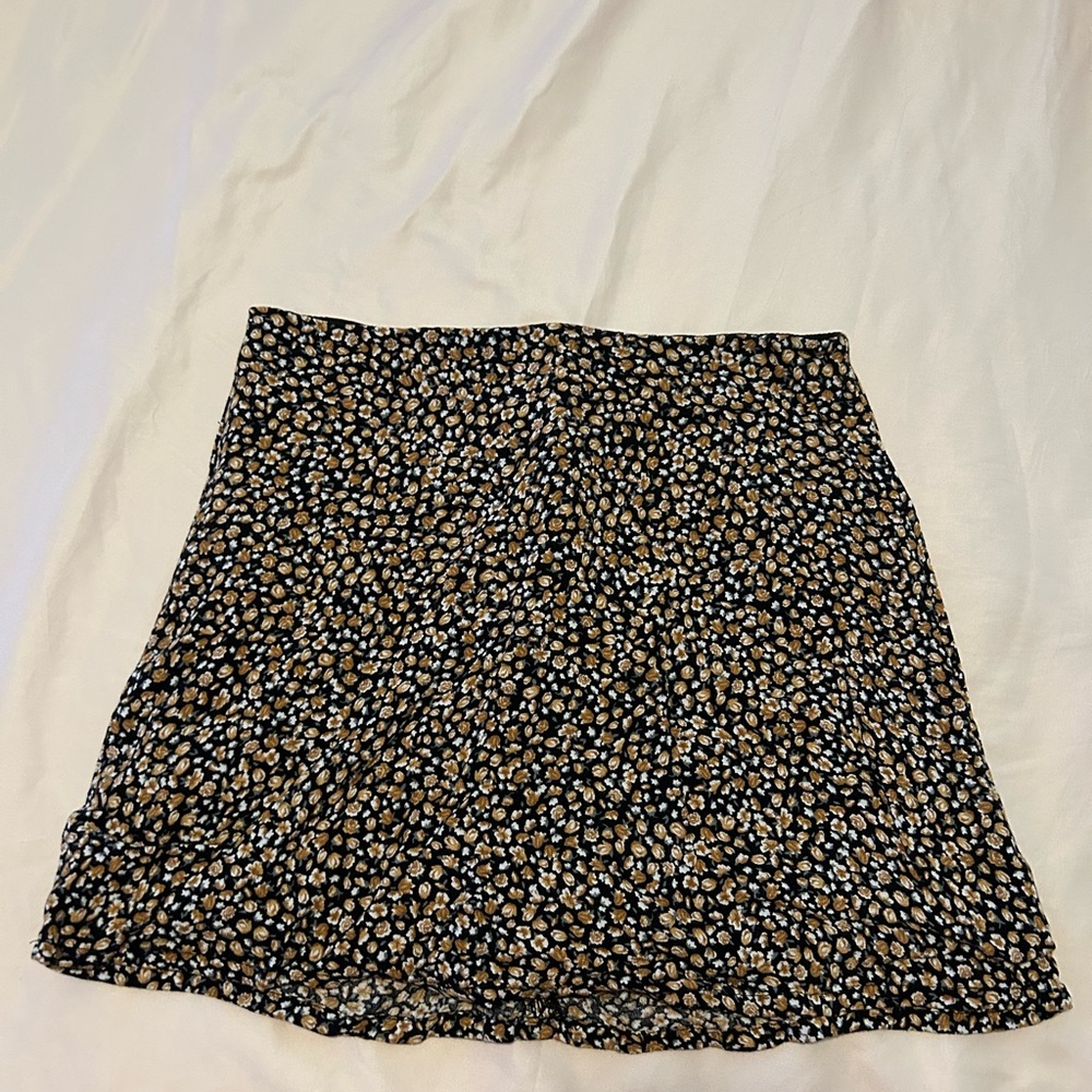 cute skirt pairs really nice with a cute black sweater